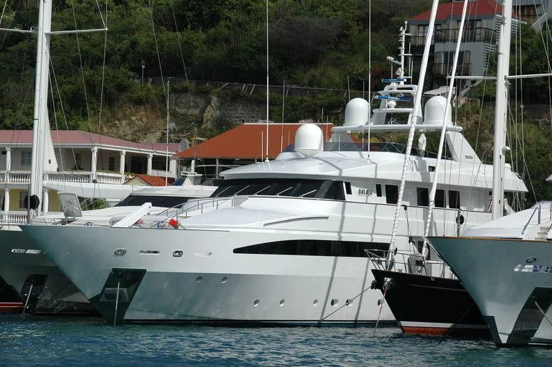 several boats docked at a pier aboard ARTEMISEA Yacht for Sale