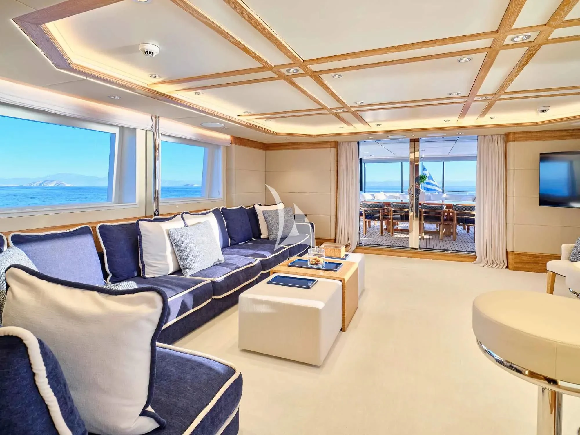 a living room with a large window aboard ARTEMISEA Yacht for Sale