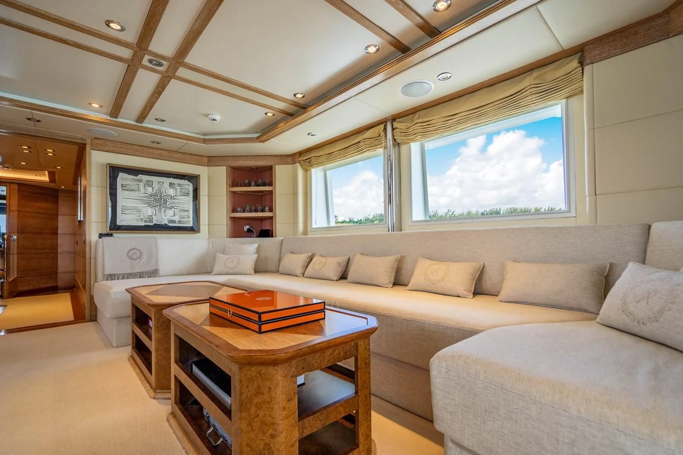 a living room with a couch and a table aboard ARTEMISEA Yacht for Sale