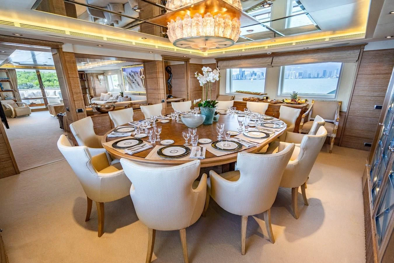 a large dining room with tables and chairs aboard ARTEMISEA Yacht for Sale