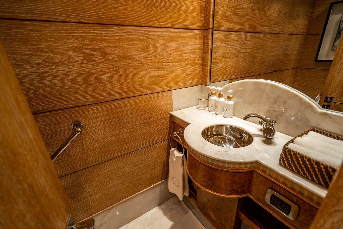 a bathroom with a sink and a bathtub aboard ARTEMISEA Yacht for Sale