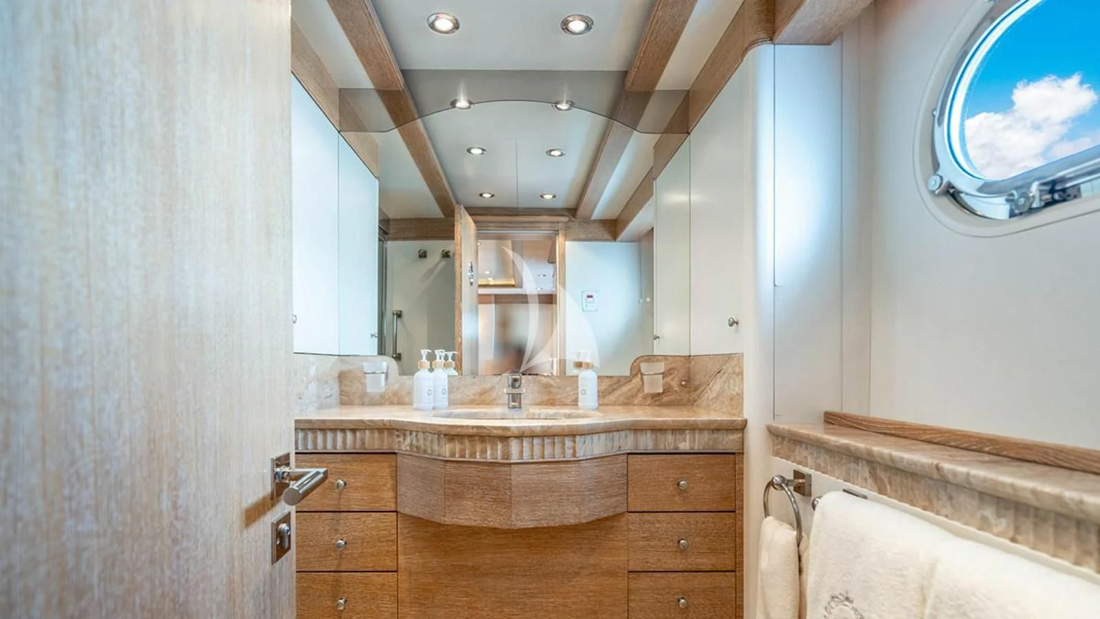 a bathroom with a large mirror aboard ARTEMISEA Yacht for Sale