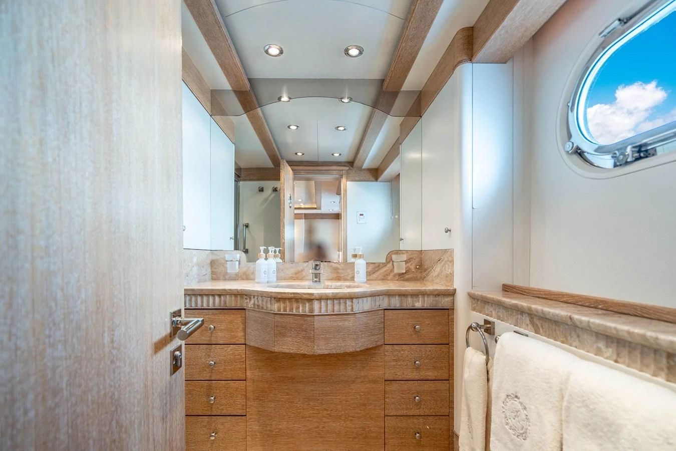 a bathroom with a large mirror aboard ARTEMISEA Yacht for Sale