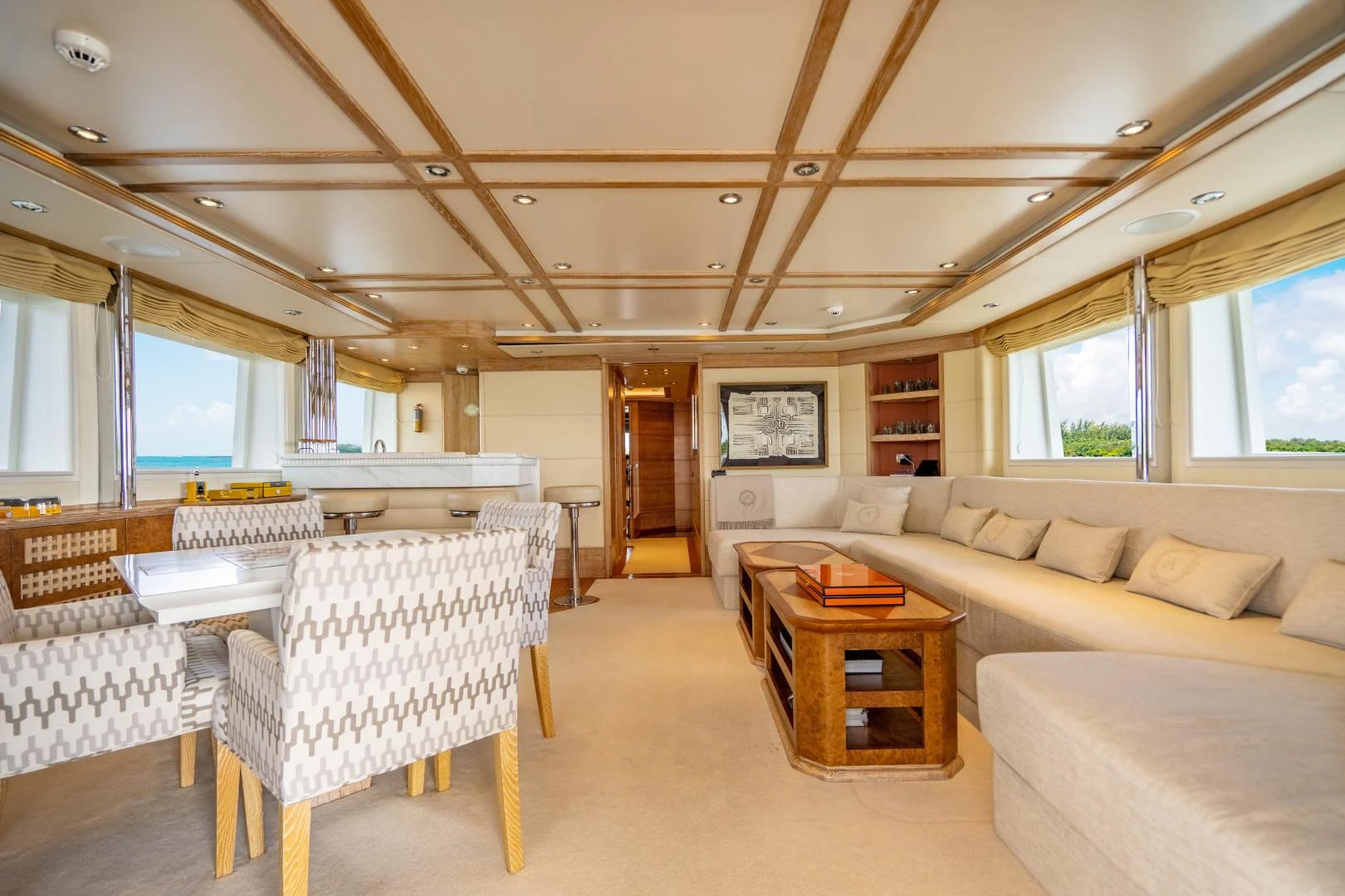 a living room with a couch and a table aboard ARTEMISEA Yacht for Sale