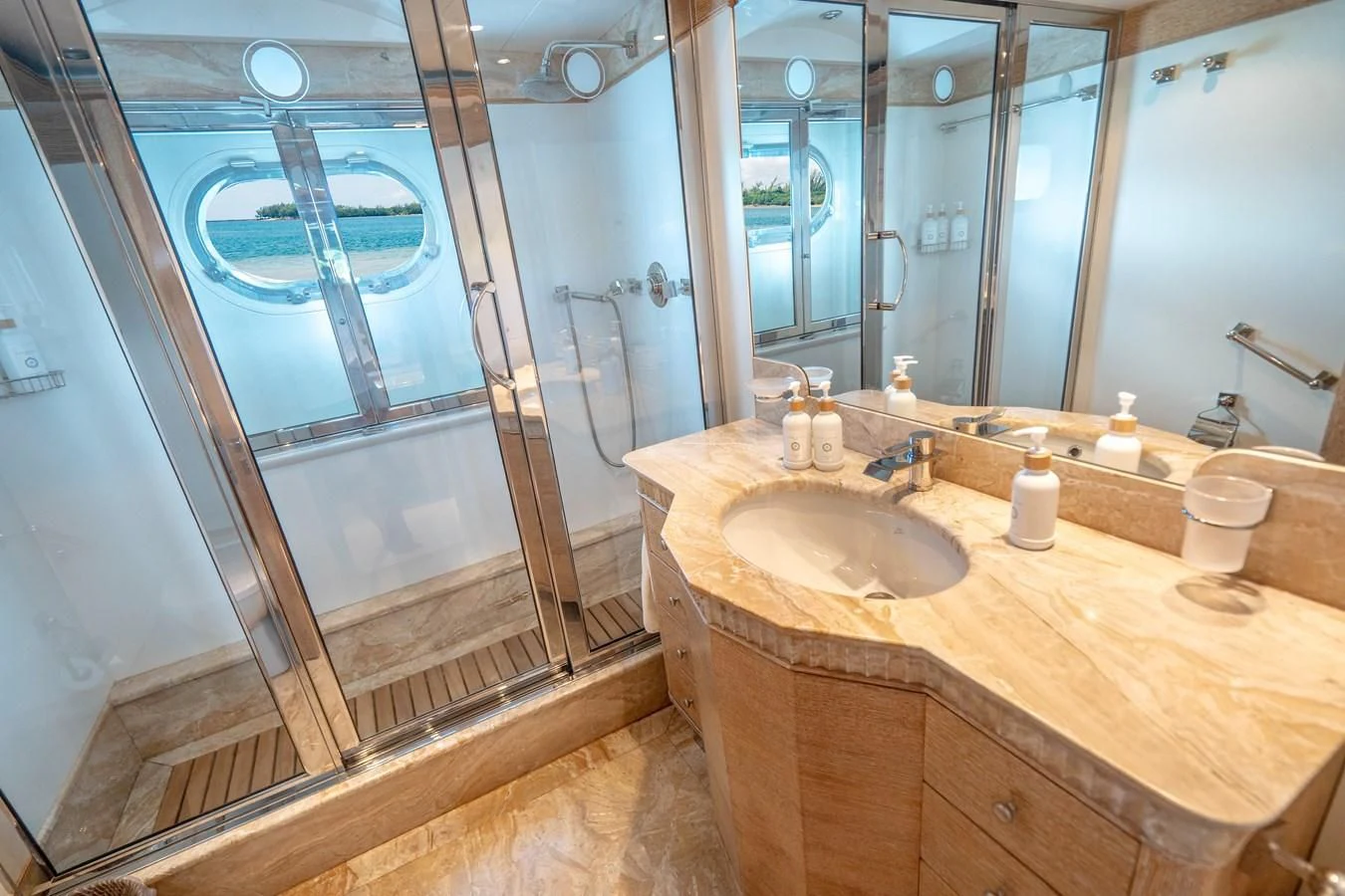 a bathroom with a sink and a shower aboard ARTEMISEA Yacht for Sale