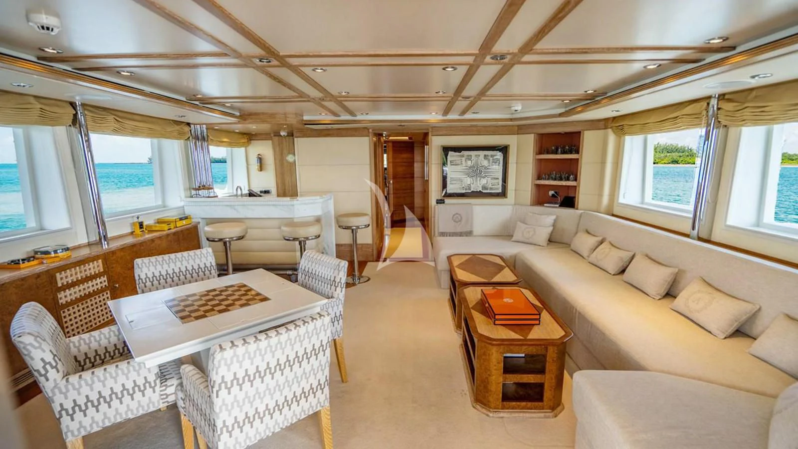 a living room with a couch and a table aboard ARTEMISEA Yacht for Sale