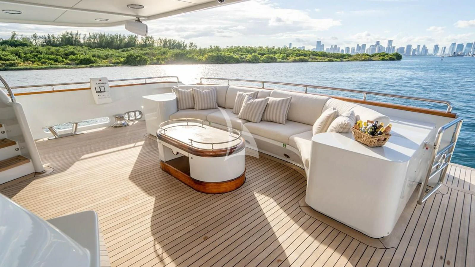 a room with a couch and a table and chairs on it aboard ARTEMISEA Yacht for Sale
