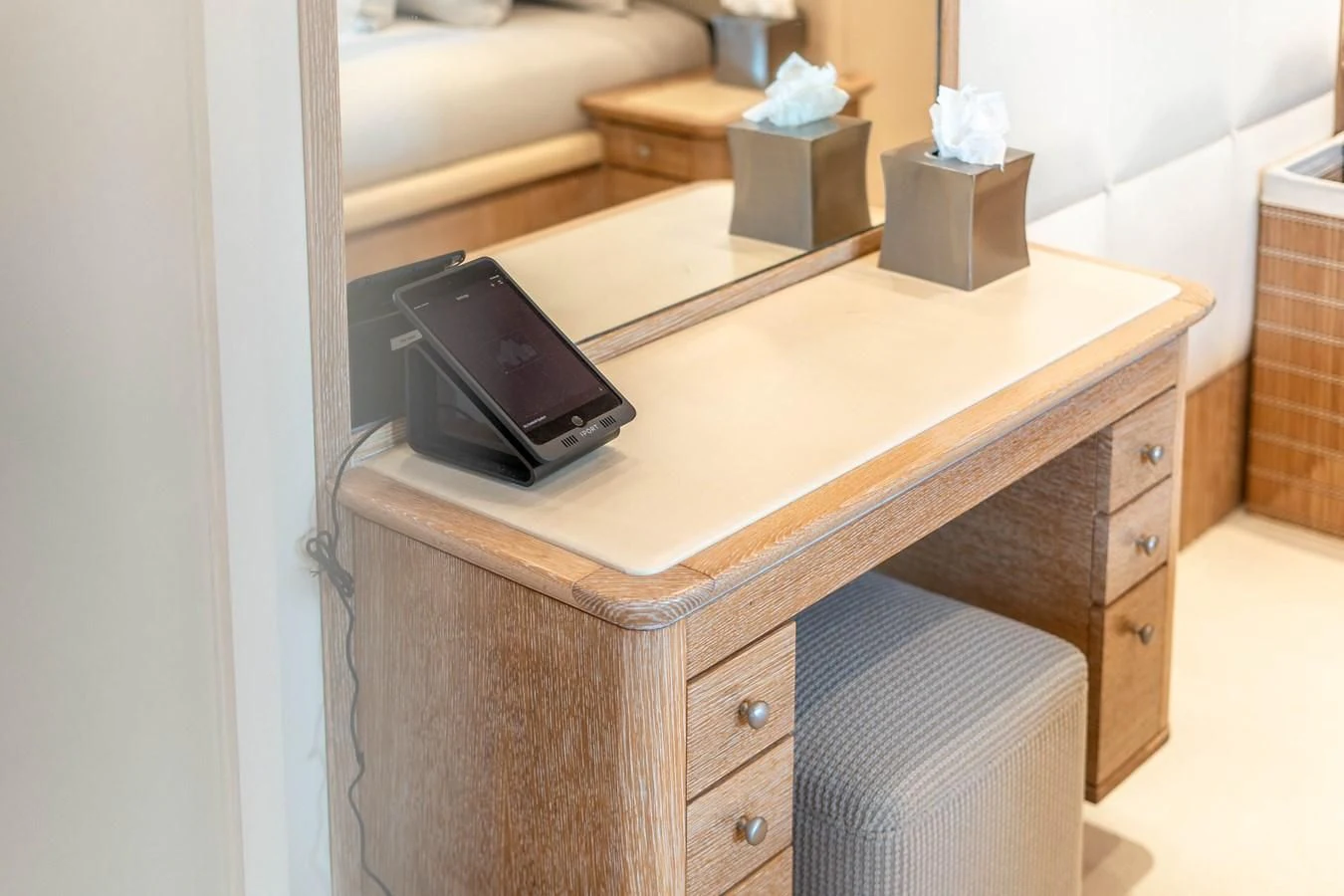 a phone on a desk aboard ARTEMISEA Yacht for Sale