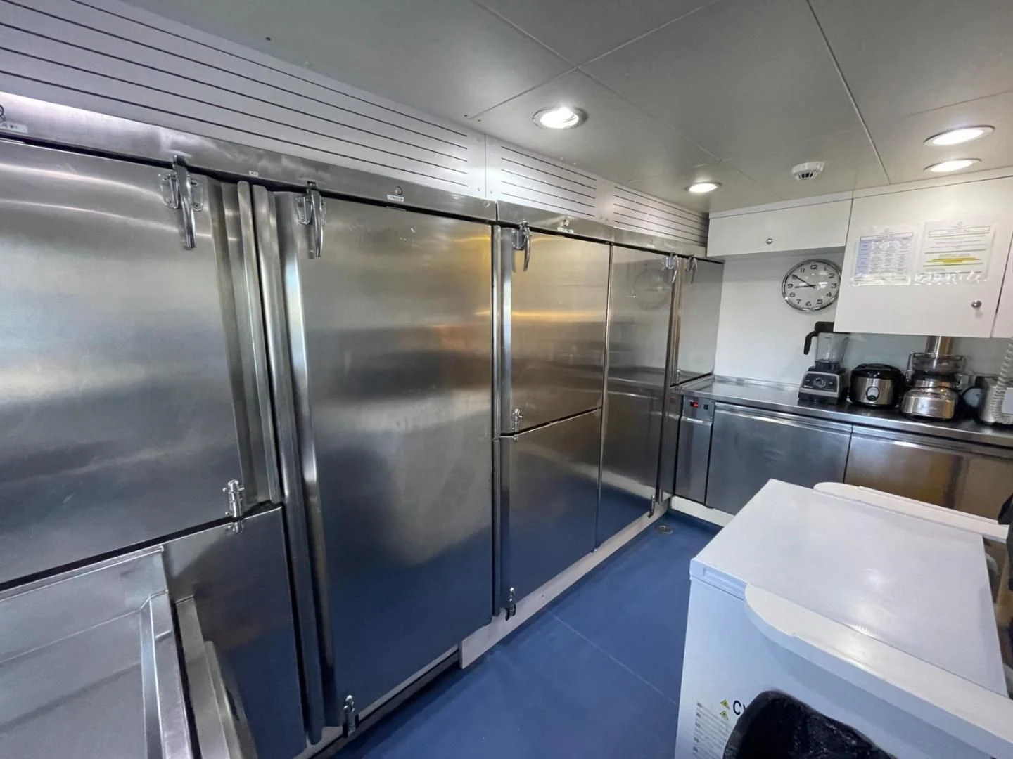 a large kitchen with stainless steel appliances aboard ARTEMISEA Yacht for Sale