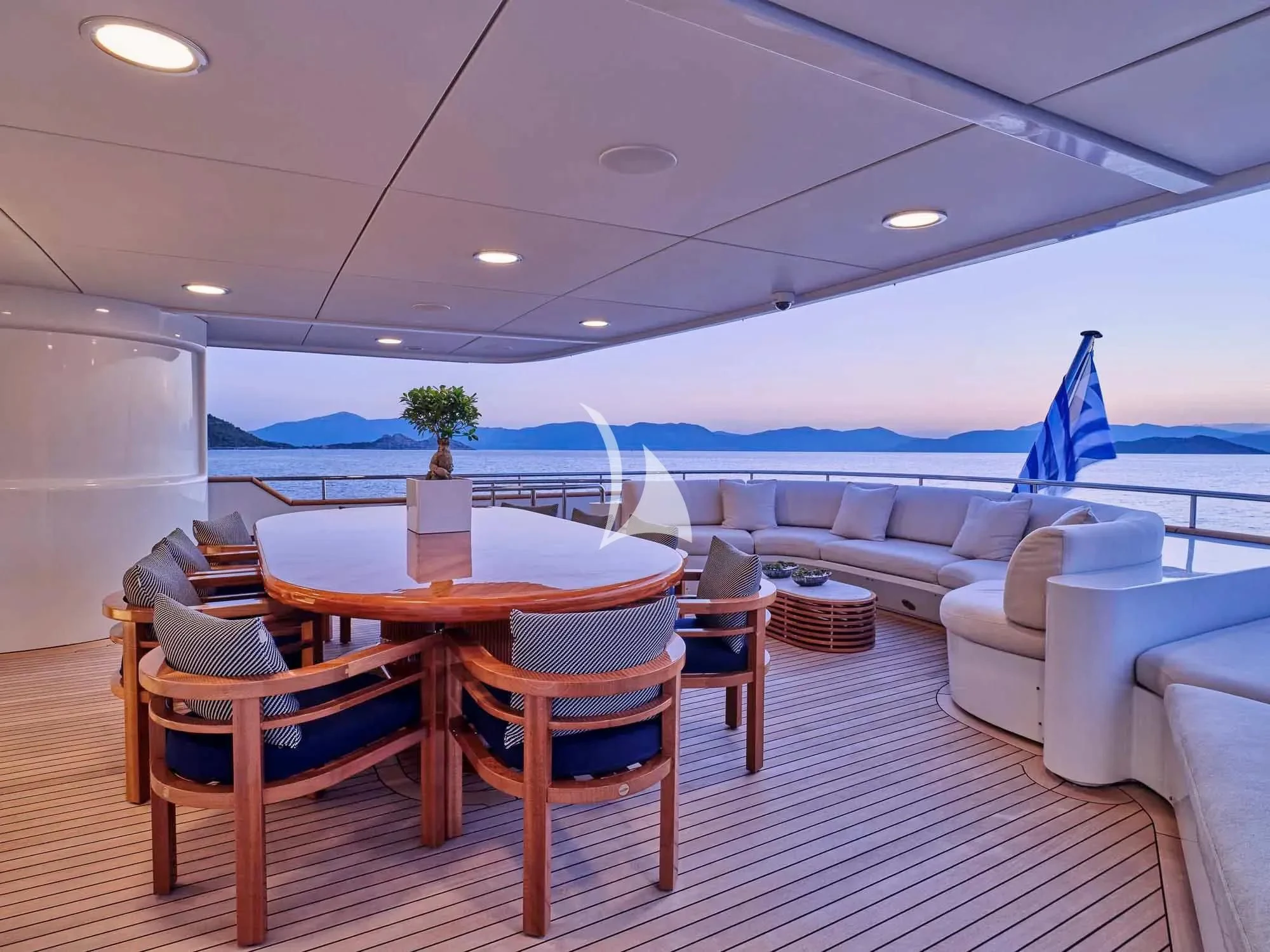 a room with a table and chairs aboard ARTEMISEA Yacht for Sale