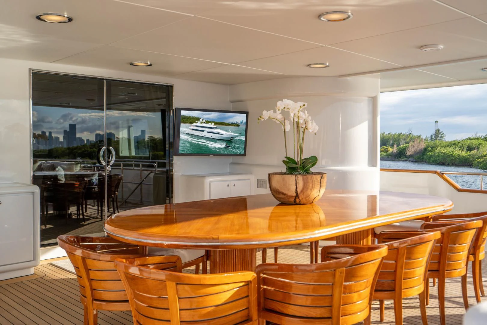 a room with a table and chairs aboard ARTEMISEA Yacht for Sale