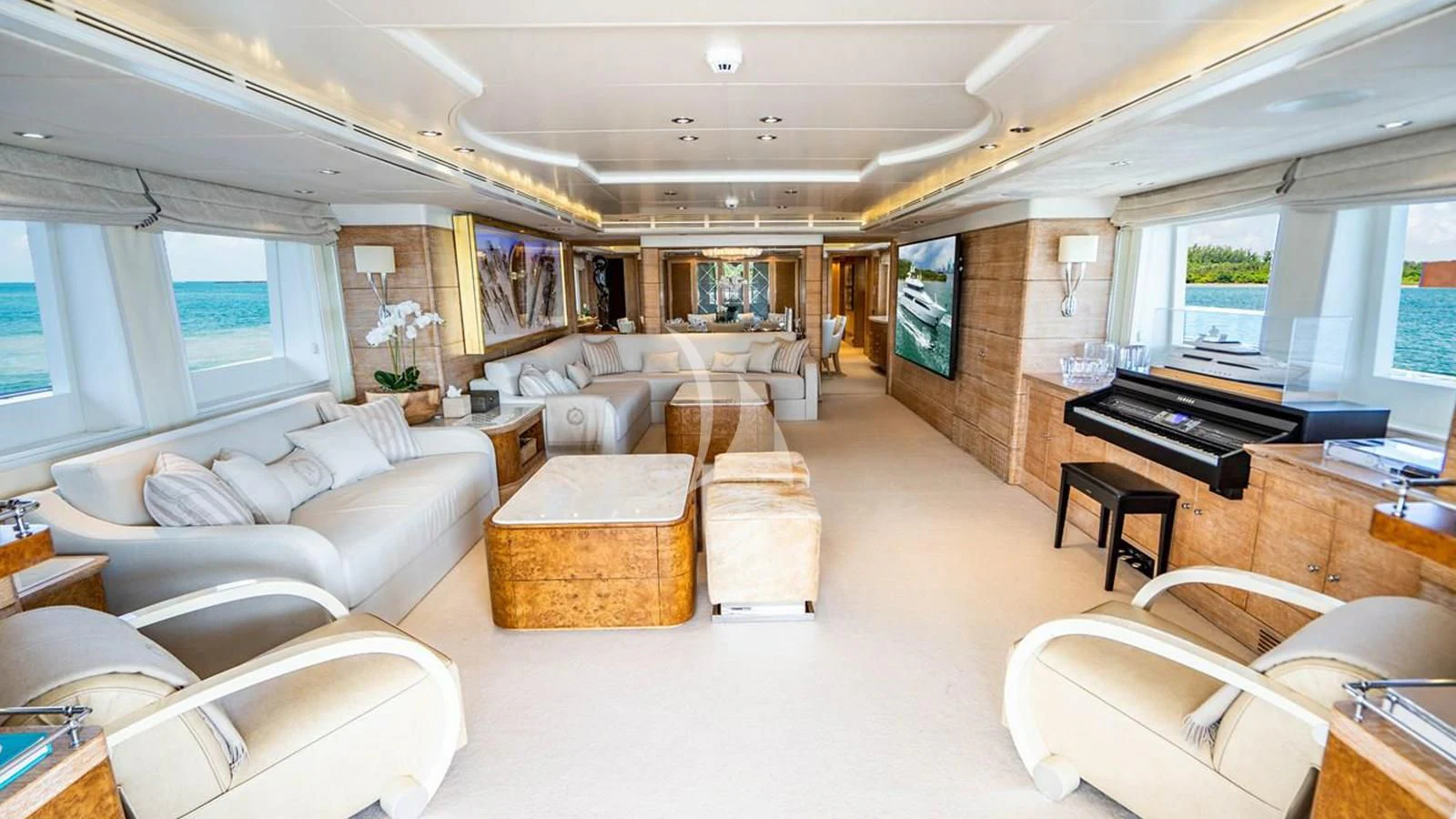 a living room with a piano aboard ARTEMISEA Yacht for Sale