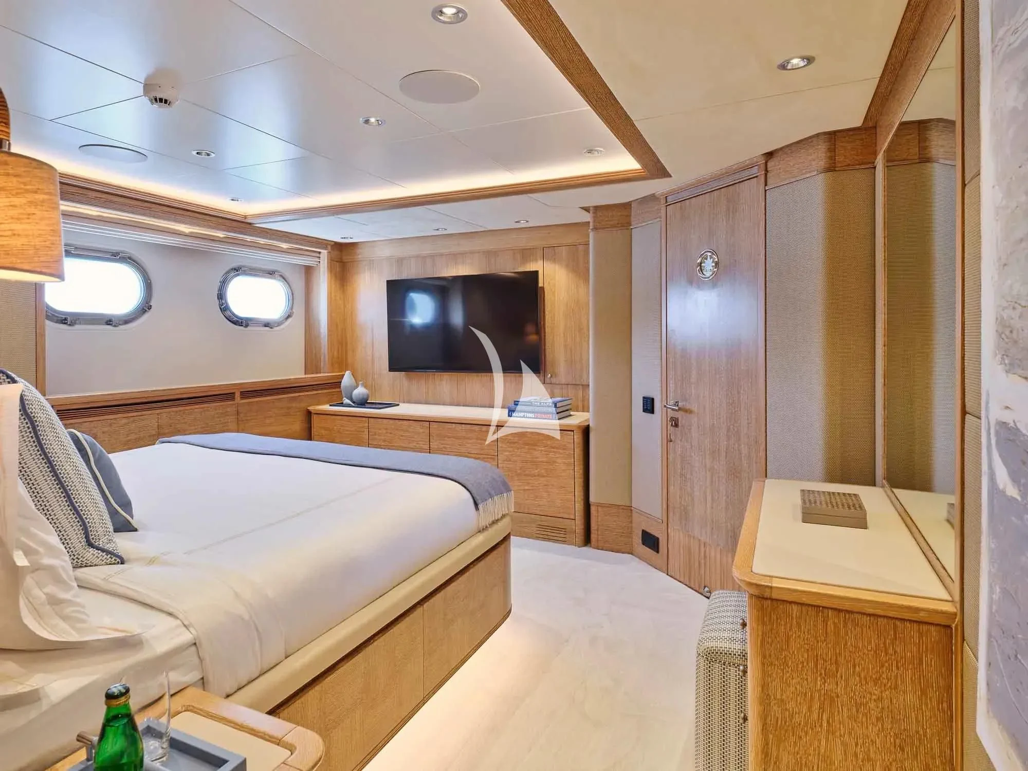 a room with a bed and a tv aboard ARTEMISEA Yacht for Sale