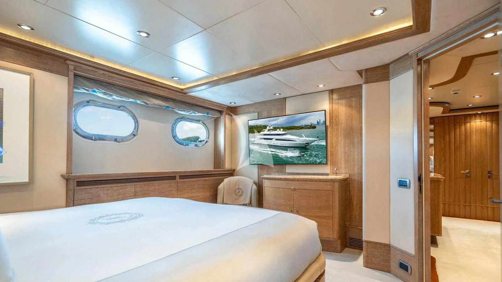 a room with a bed and a window aboard ARTEMISEA Yacht for Sale