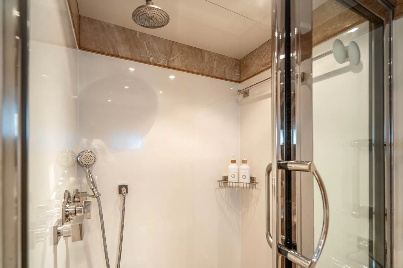 a bathroom with a shower unit and a sink aboard ARTEMISEA Yacht for Sale