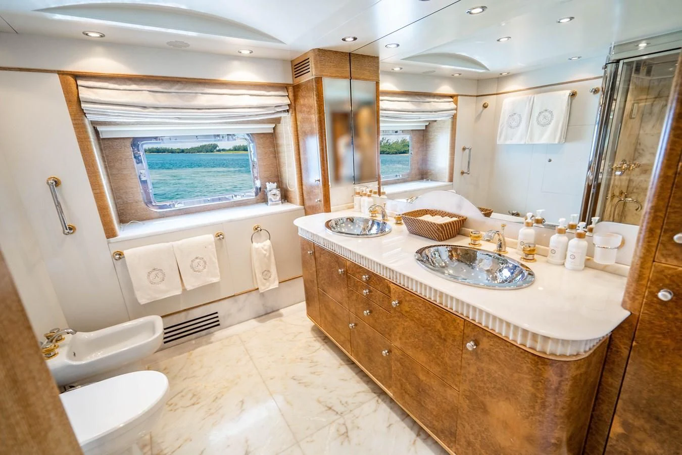 a bathroom with a sink and a bathtub aboard ARTEMISEA Yacht for Sale
