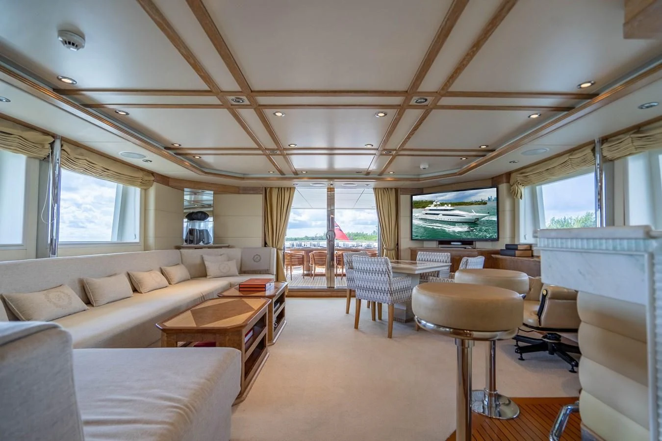 a living room with a large window aboard ARTEMISEA Yacht for Sale