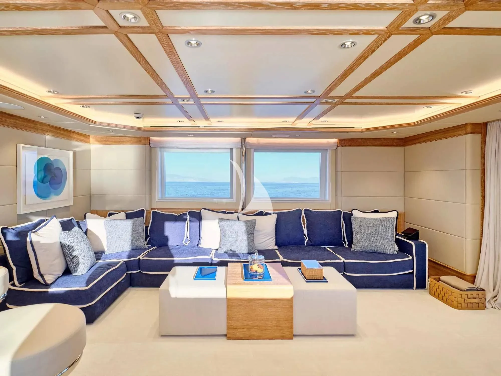 a room with a couch and a table aboard ARTEMISEA Yacht for Sale