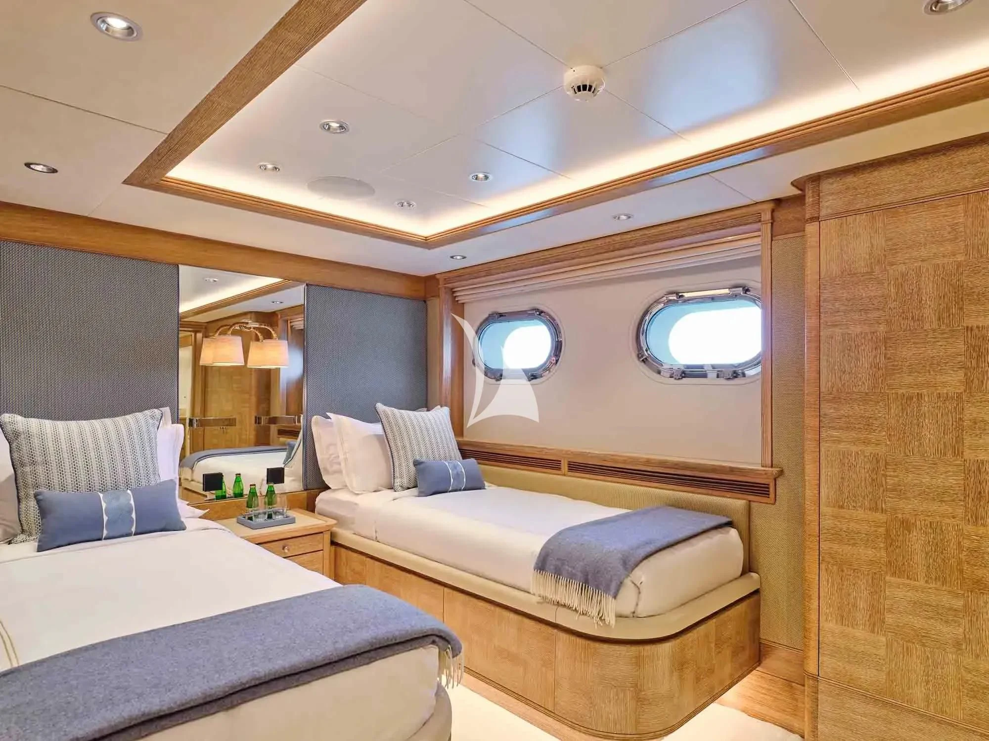 a room with a bed and a mirror aboard ARTEMISEA Yacht for Sale