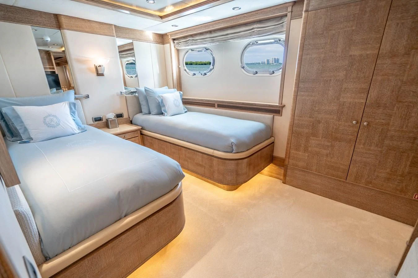 a room with a bed and a dresser aboard ARTEMISEA Yacht for Sale