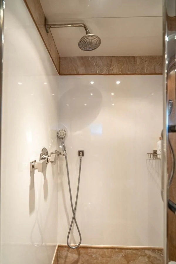 a shower with a shower head aboard ARTEMISEA Yacht for Sale