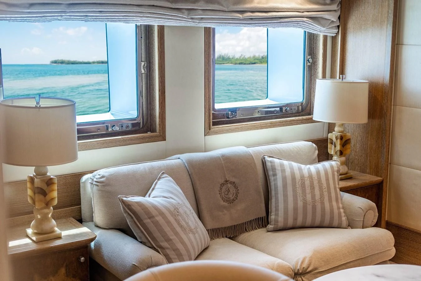 a living room with a large window aboard ARTEMISEA Yacht for Sale