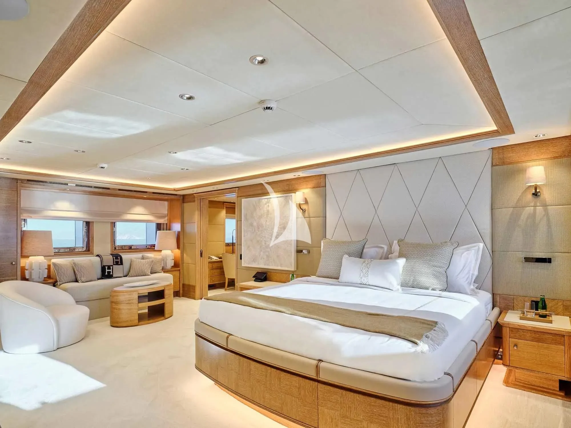 a large bedroom with a bed aboard ARTEMISEA Yacht for Sale