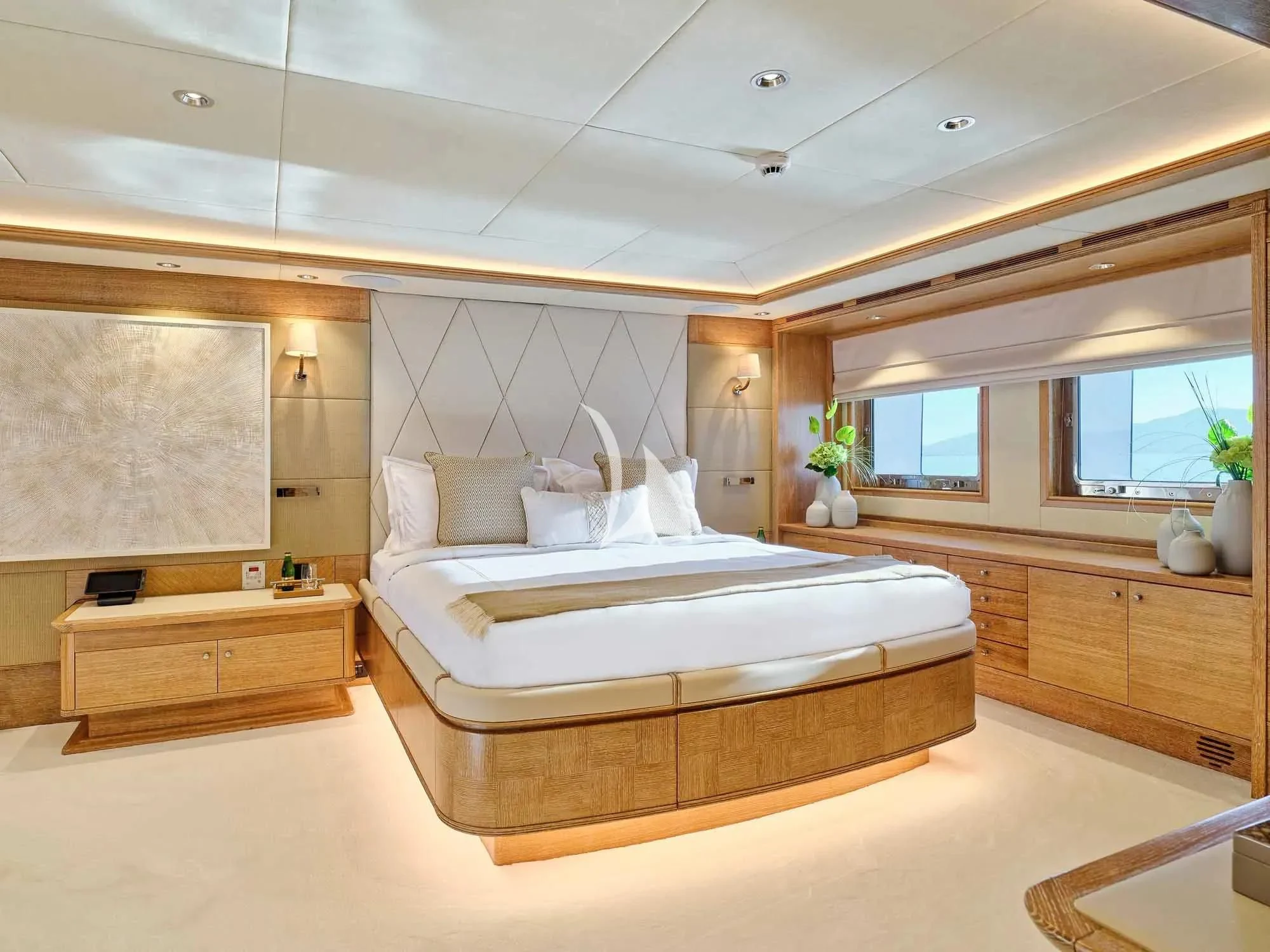 a large bedroom with a large bed aboard ARTEMISEA Yacht for Sale