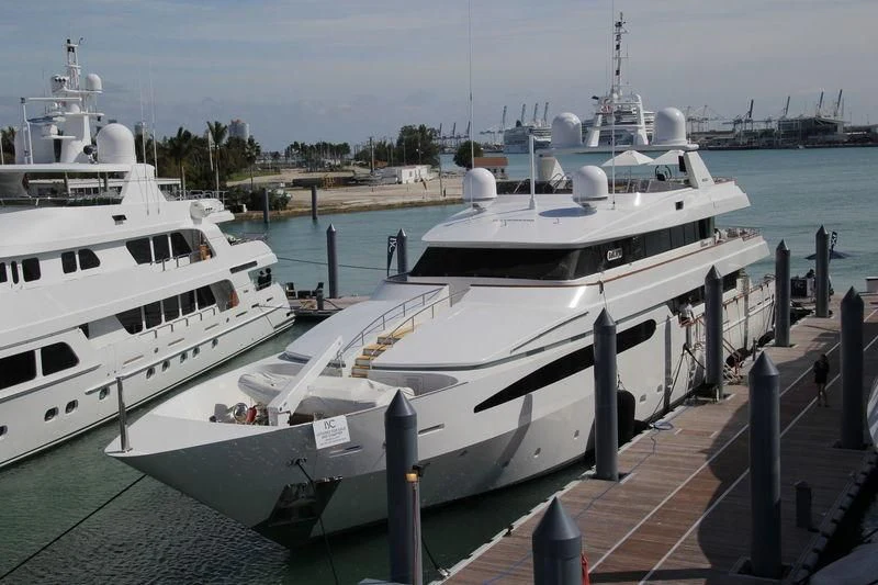 a couple of boats docked at a pier aboard ARTEMISEA Yacht for Sale
