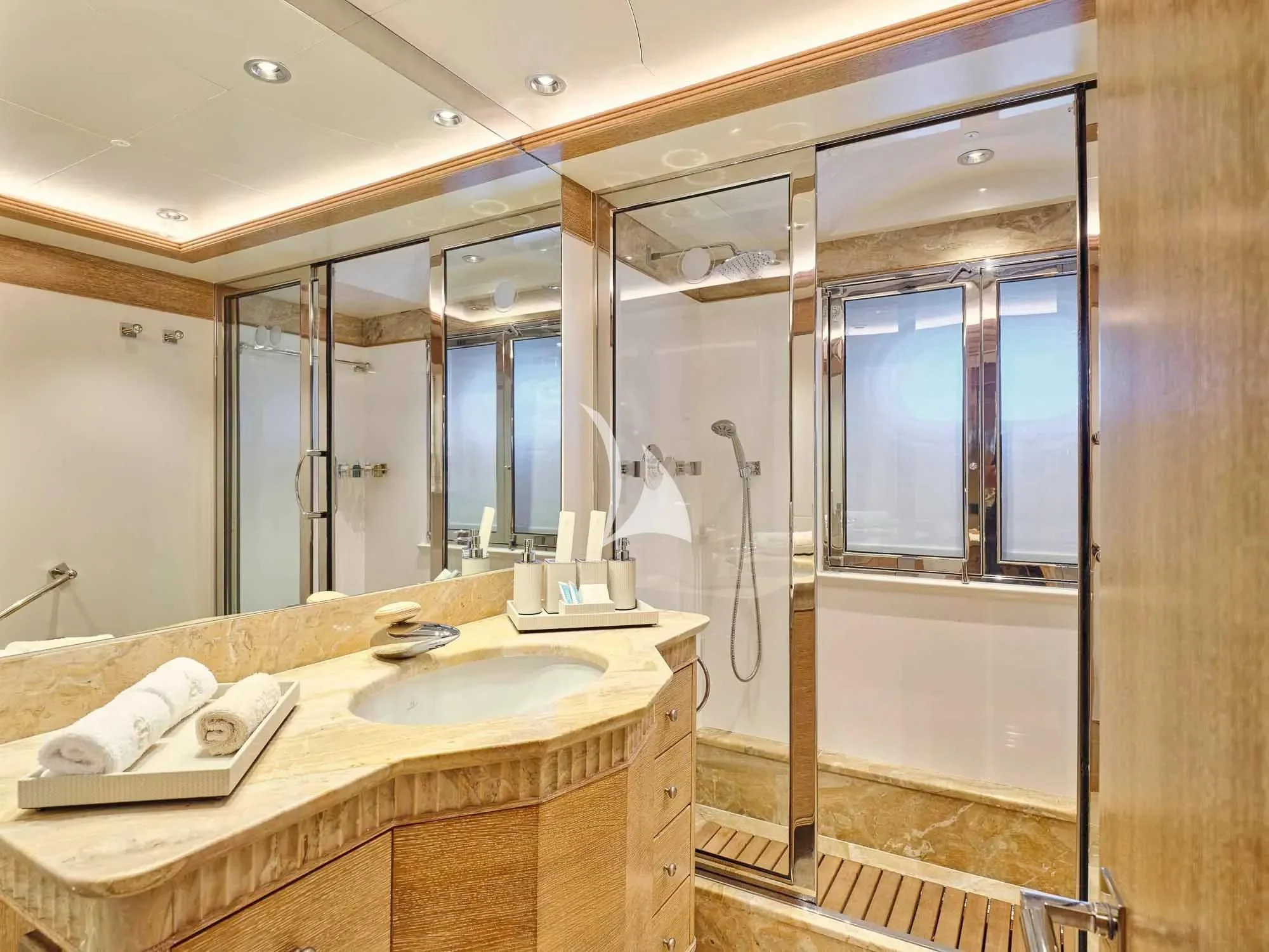 a bathroom with a sink and a mirror aboard ARTEMISEA Yacht for Sale
