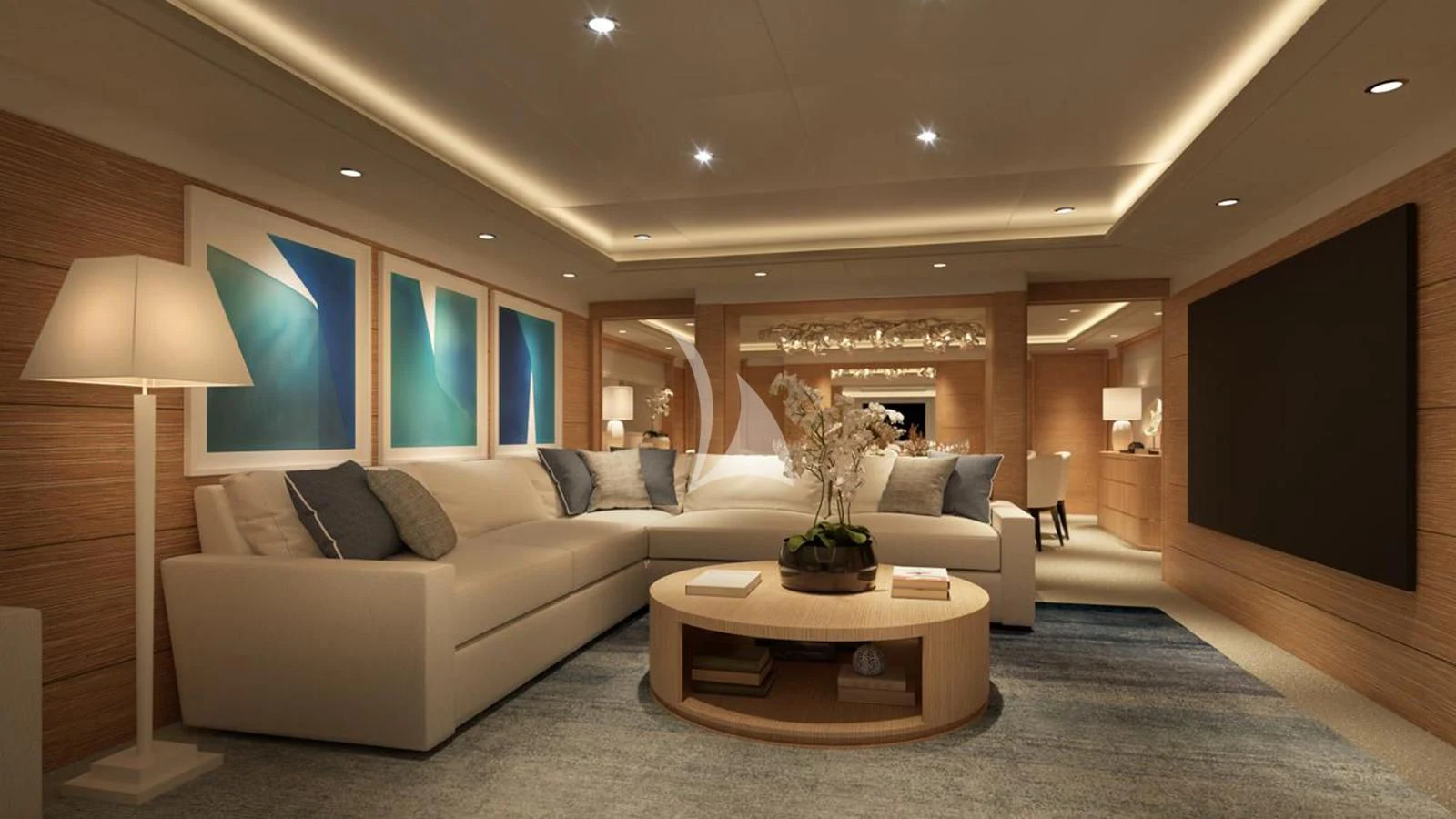 a living room with a large white couch and a large mirror aboard ARTEMISEA Yacht for Sale