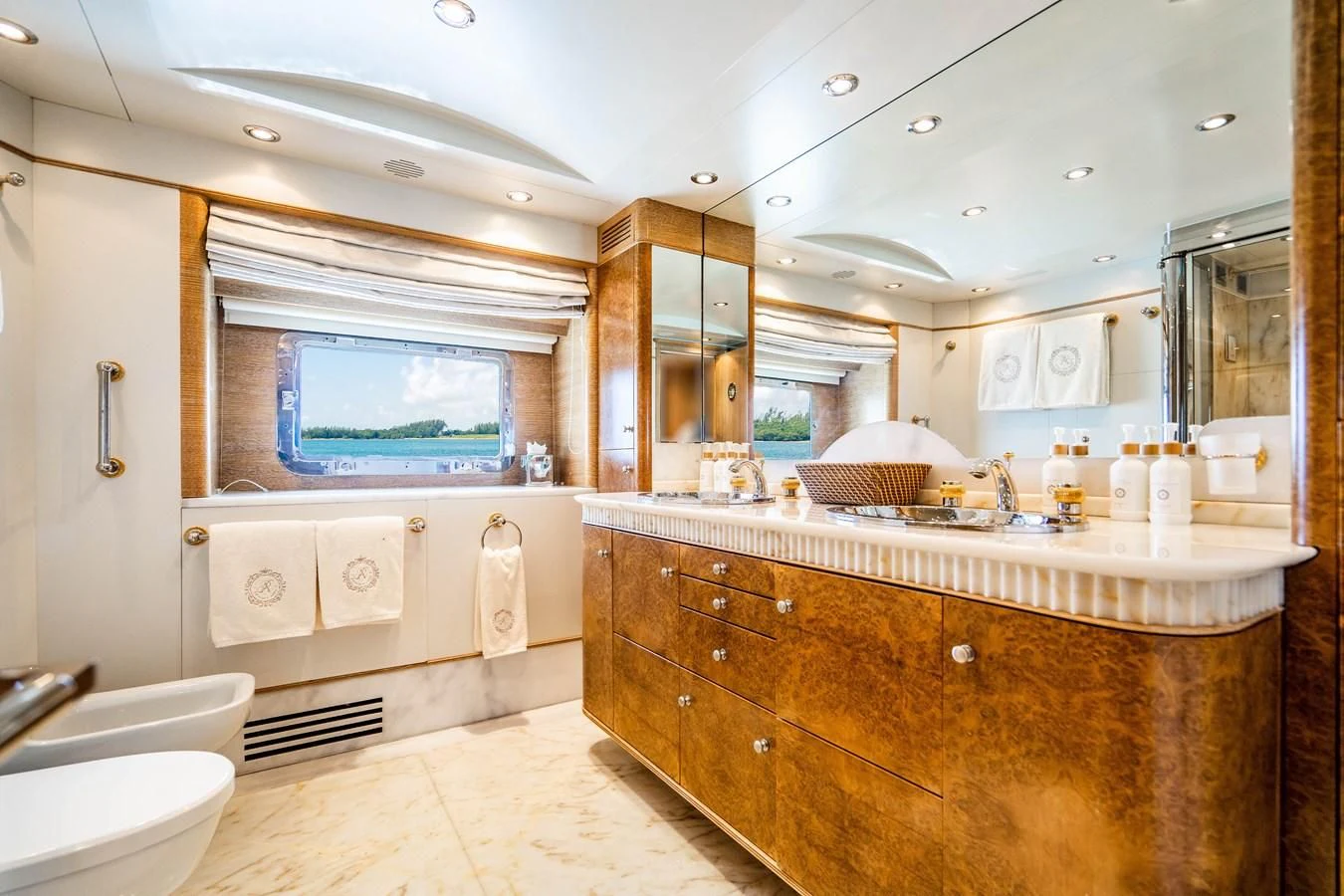 a bathroom with a large mirror aboard ARTEMISEA Yacht for Sale