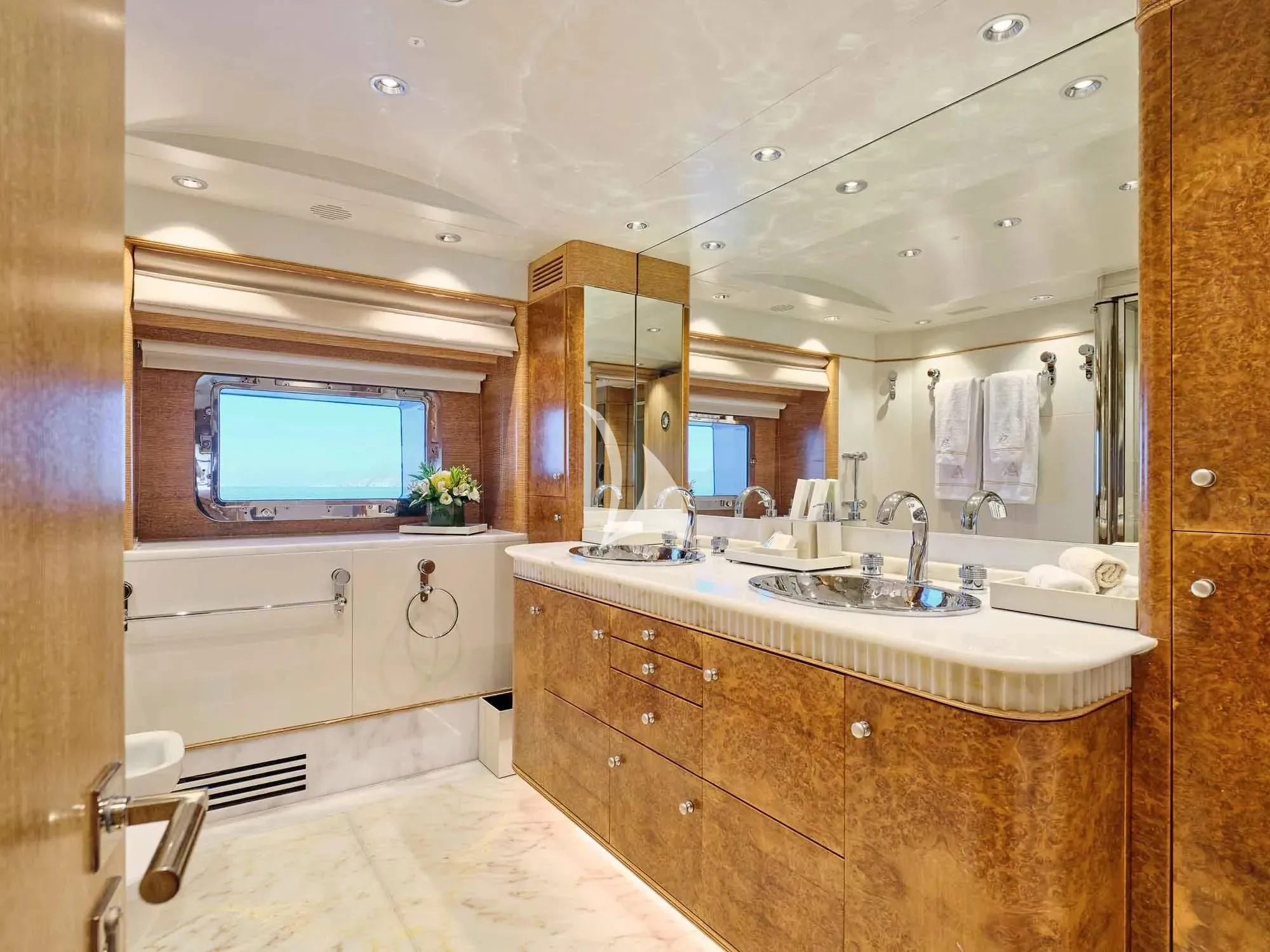 a bathroom with a large mirror aboard ARTEMISEA Yacht for Sale