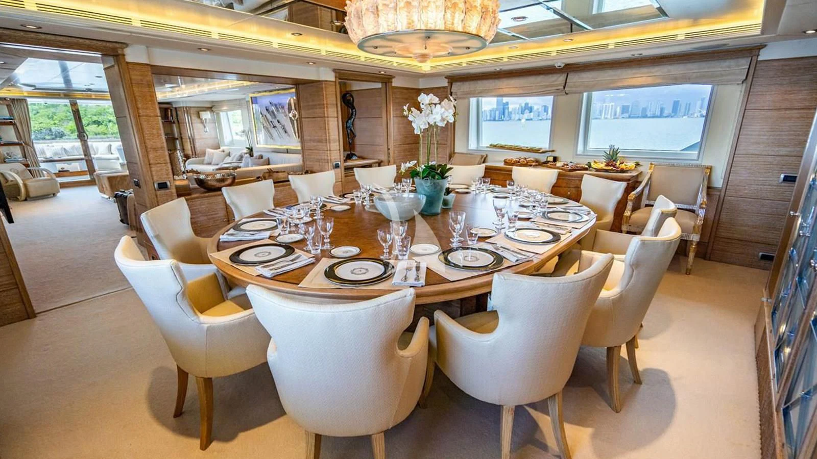 a large dining room with chairs aboard ARTEMISEA Yacht for Sale