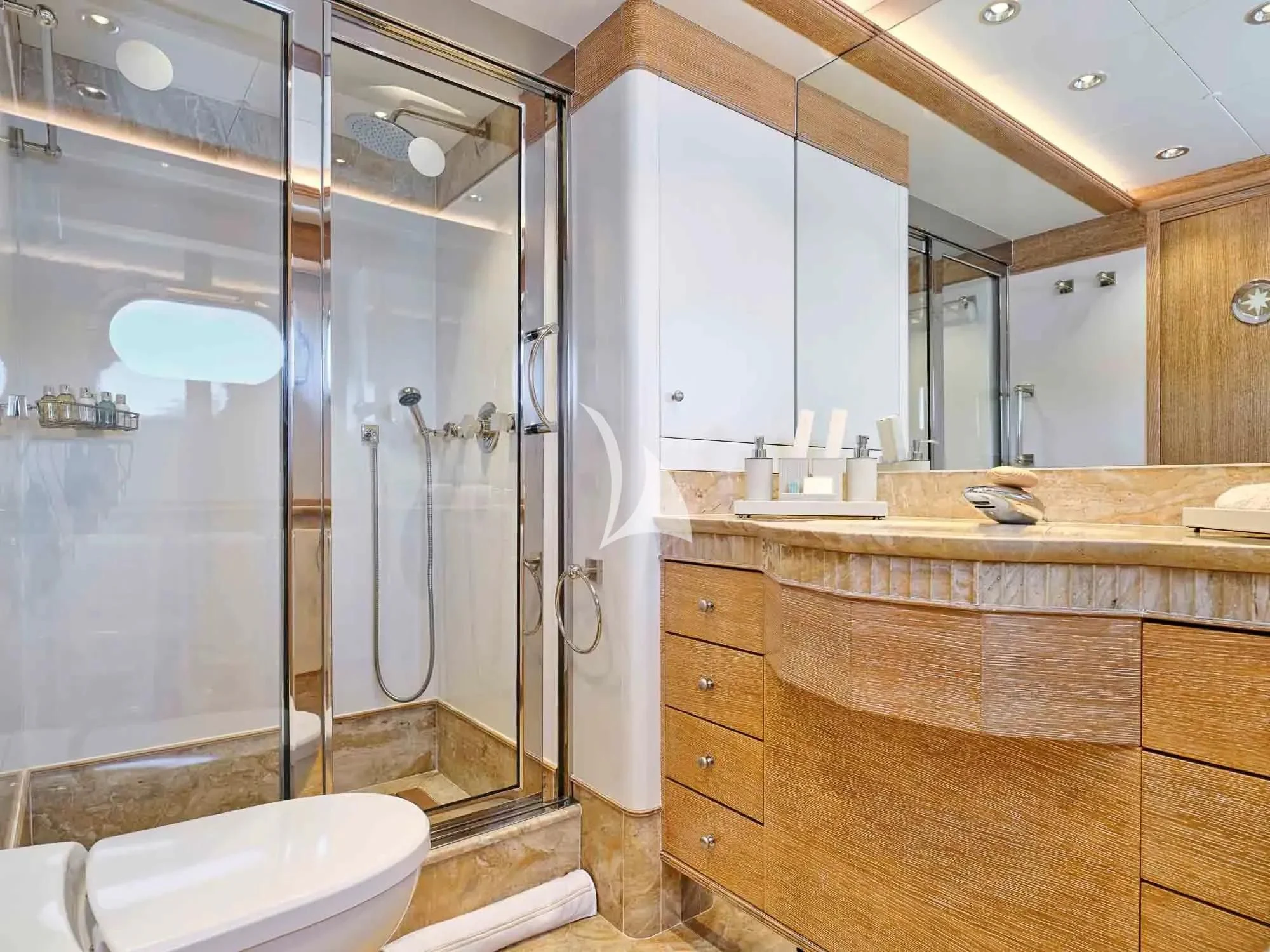 a bathroom with a glass shower aboard ARTEMISEA Yacht for Sale