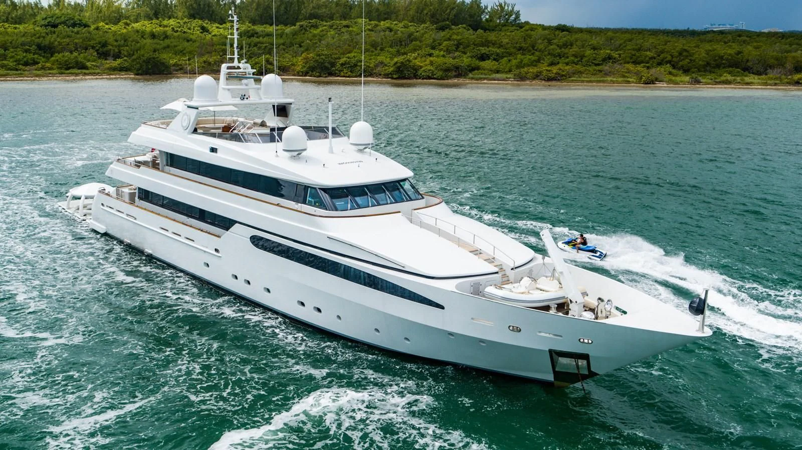 a white boat on water aboard ARTEMISEA Yacht for Sale