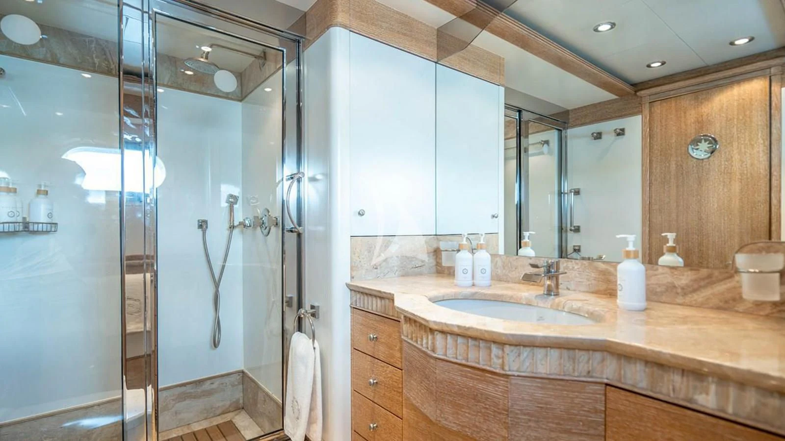 a bathroom with a shower unit and sink aboard ARTEMISEA Yacht for Sale