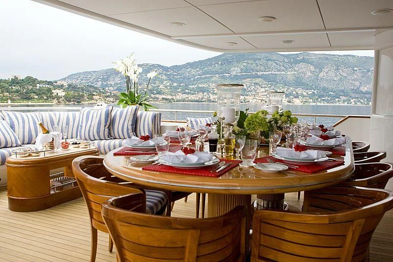 a table set for a meal aboard ARTEMISEA Yacht for Sale