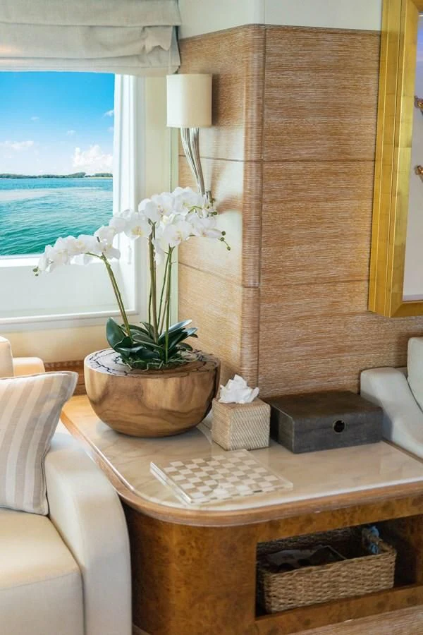 a plant in a pot on a table aboard ARTEMISEA Yacht for Sale