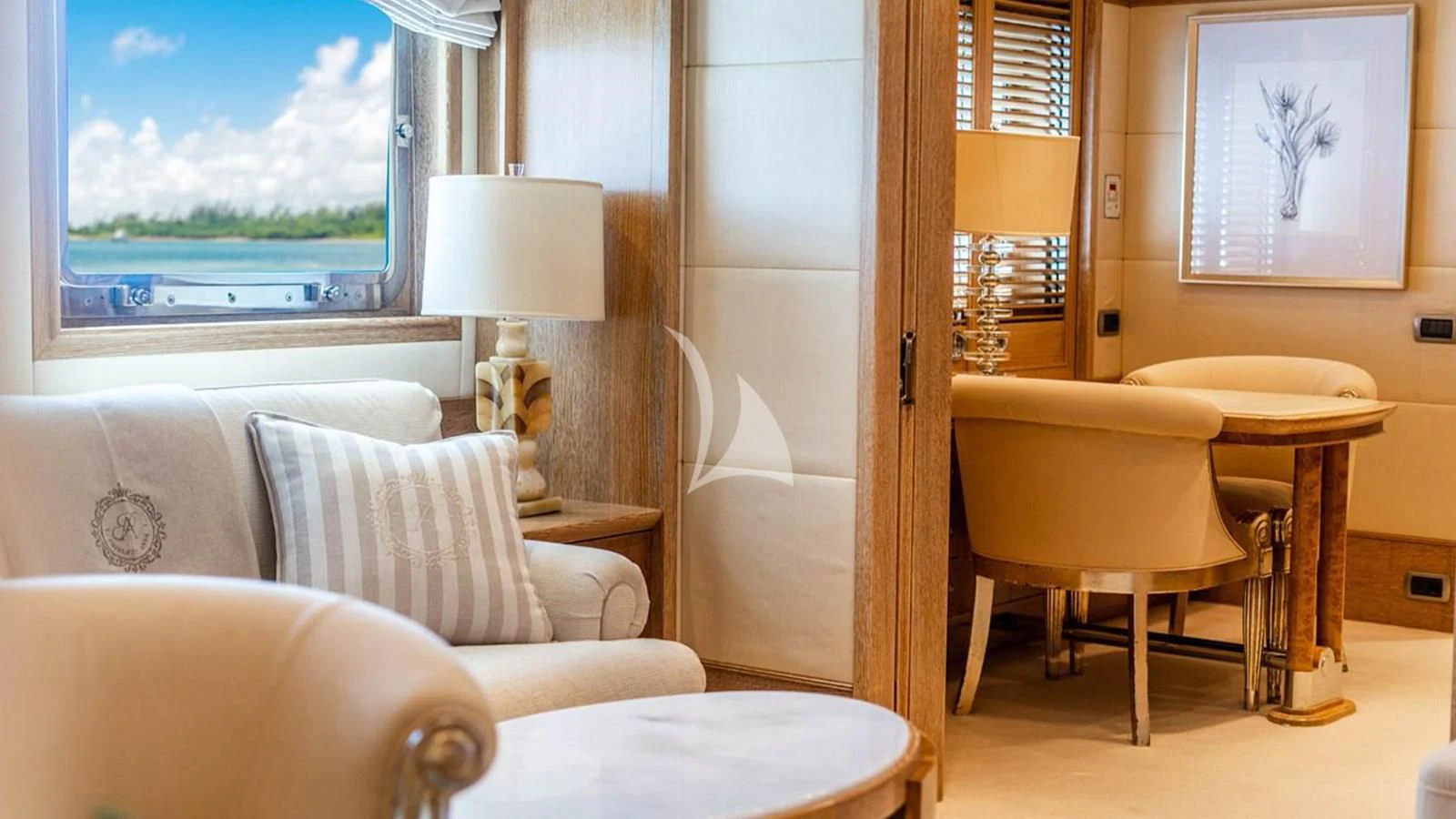 a room with a table and chairs aboard ARTEMISEA Yacht for Sale