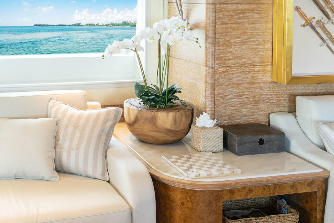 a wood table with a plant in a pot on it aboard ARTEMISEA Yacht for Sale