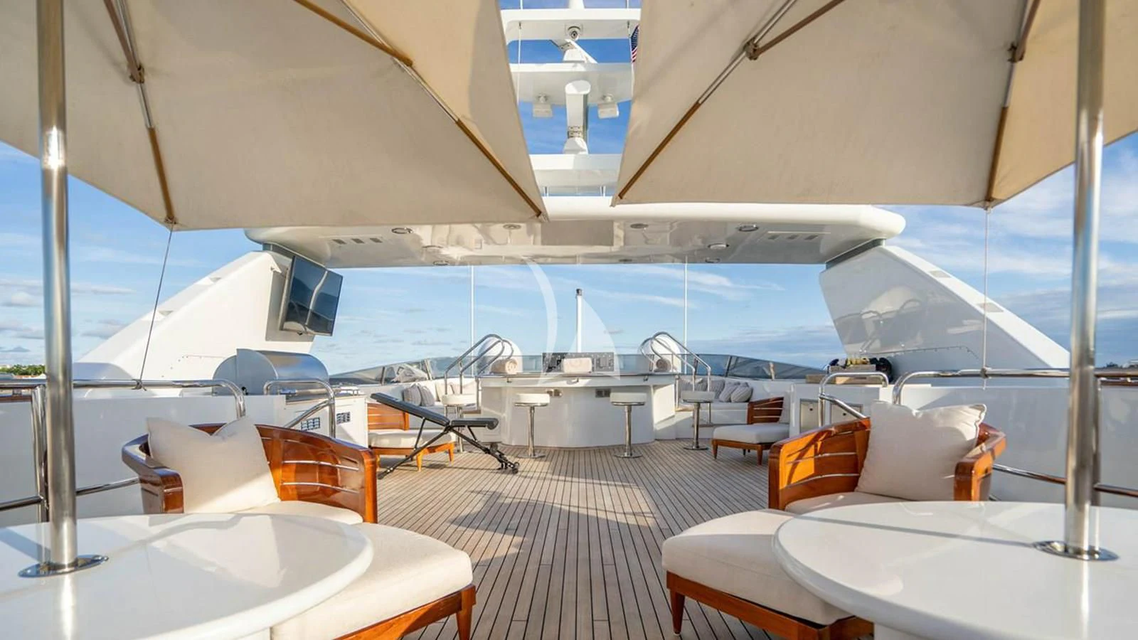 a large white tent with chairs and tables aboard ARTEMISEA Yacht for Sale