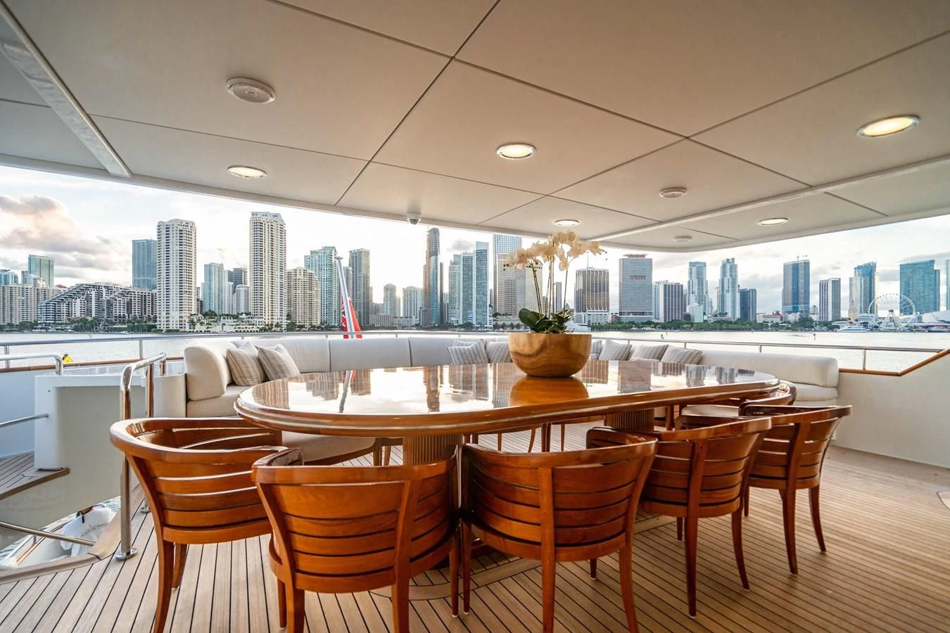 a large room with tables and chairs aboard ARTEMISEA Yacht for Sale