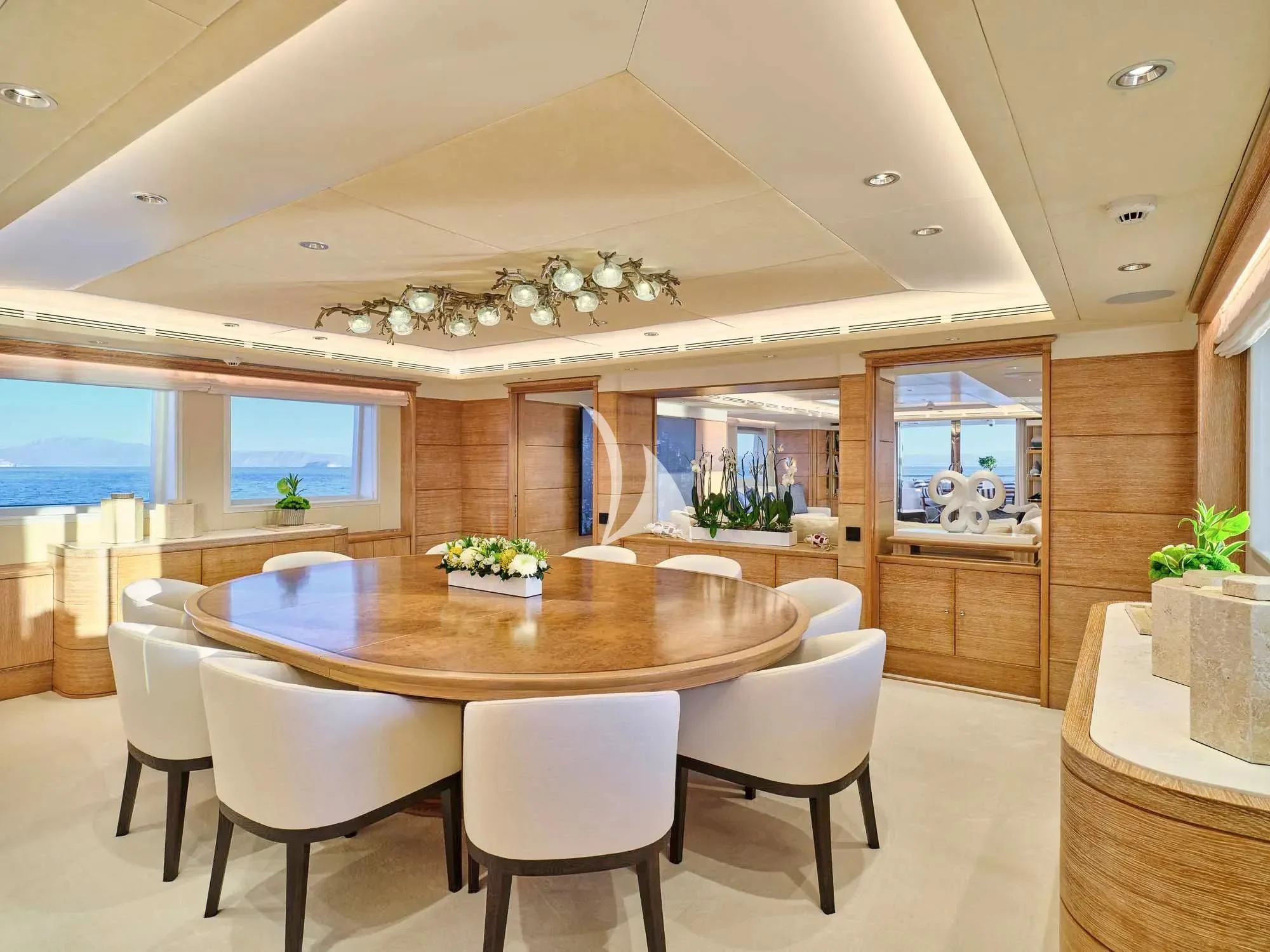 a large kitchen with a table aboard ARTEMISEA Yacht for Sale