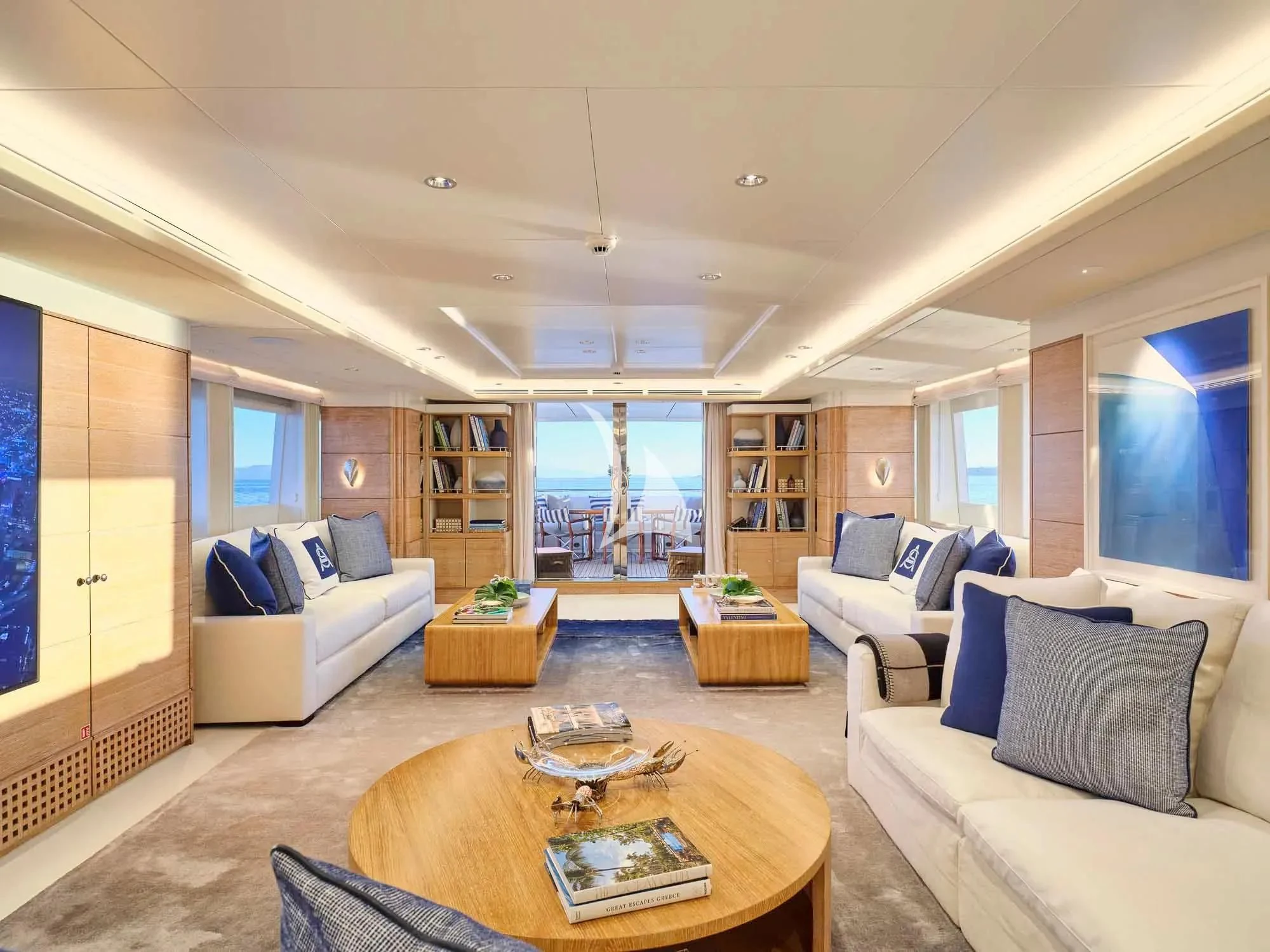 a living room with a large window aboard ARTEMISEA Yacht for Sale