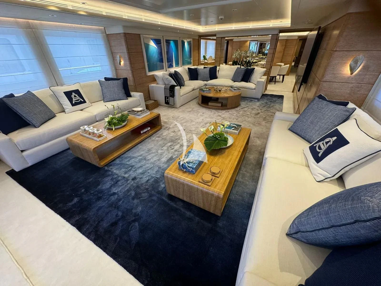 a living room with a large window aboard ARTEMISEA Yacht for Sale