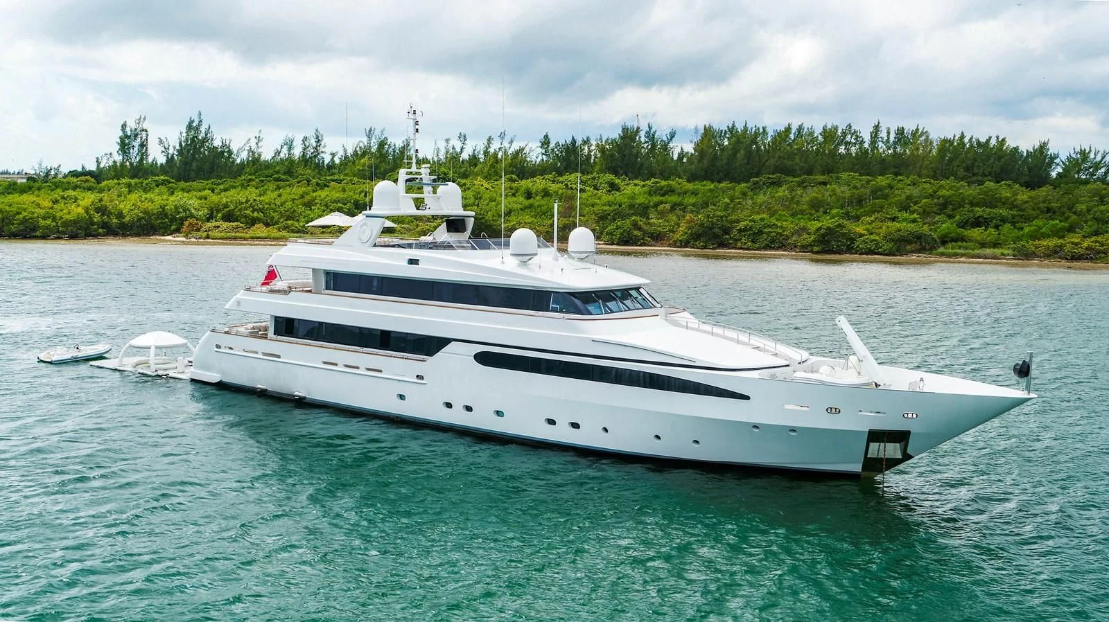 a white yacht in the water aboard ARTEMISEA Yacht for Sale