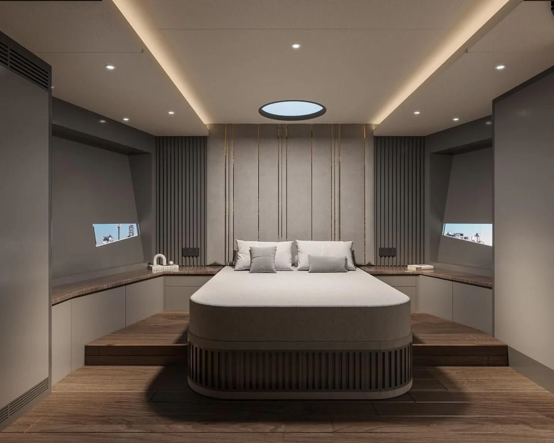 a room with a bed and a large mirror aboard AQUITALIA 68 Yacht for Sale