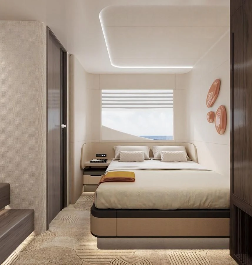 a bedroom with a bed and a window aboard AQUITALIA 68 Yacht for Sale