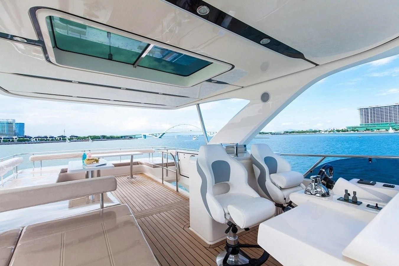 a room with a view of the ocean and the deck aboard AQUITALIA 68 Yacht for Sale
